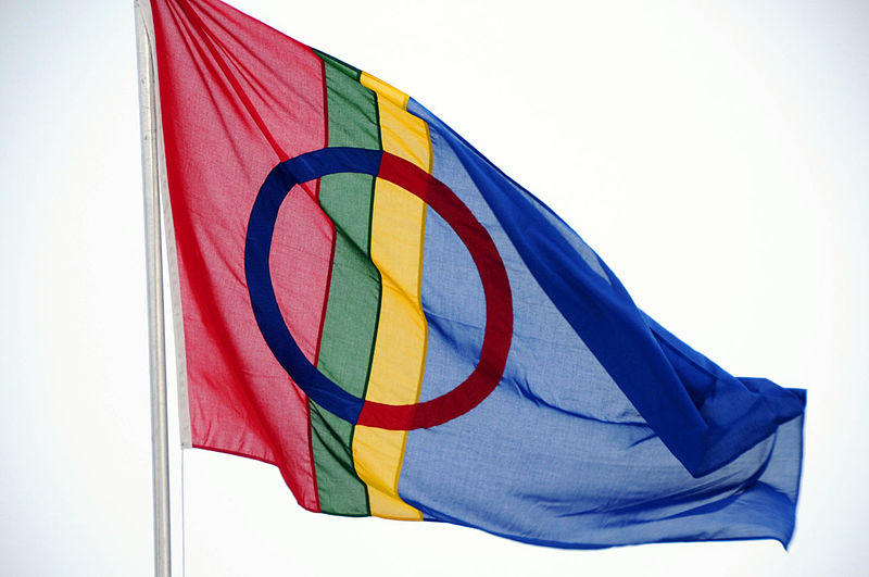 This image has an empty alt attribute; its file name is 800px-Saami_flag_Tromsø_Norway.jpg