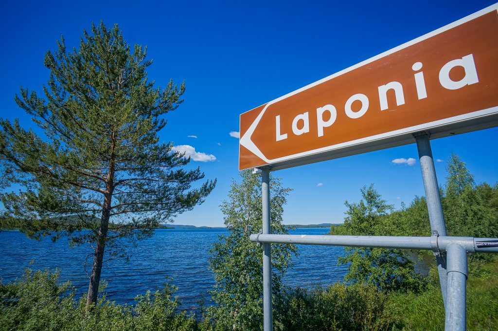 Street sign pointing at Laponia