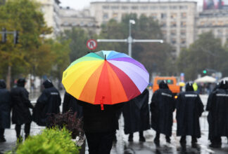 LGBTI umbrella stands out in front of police force in Serbia