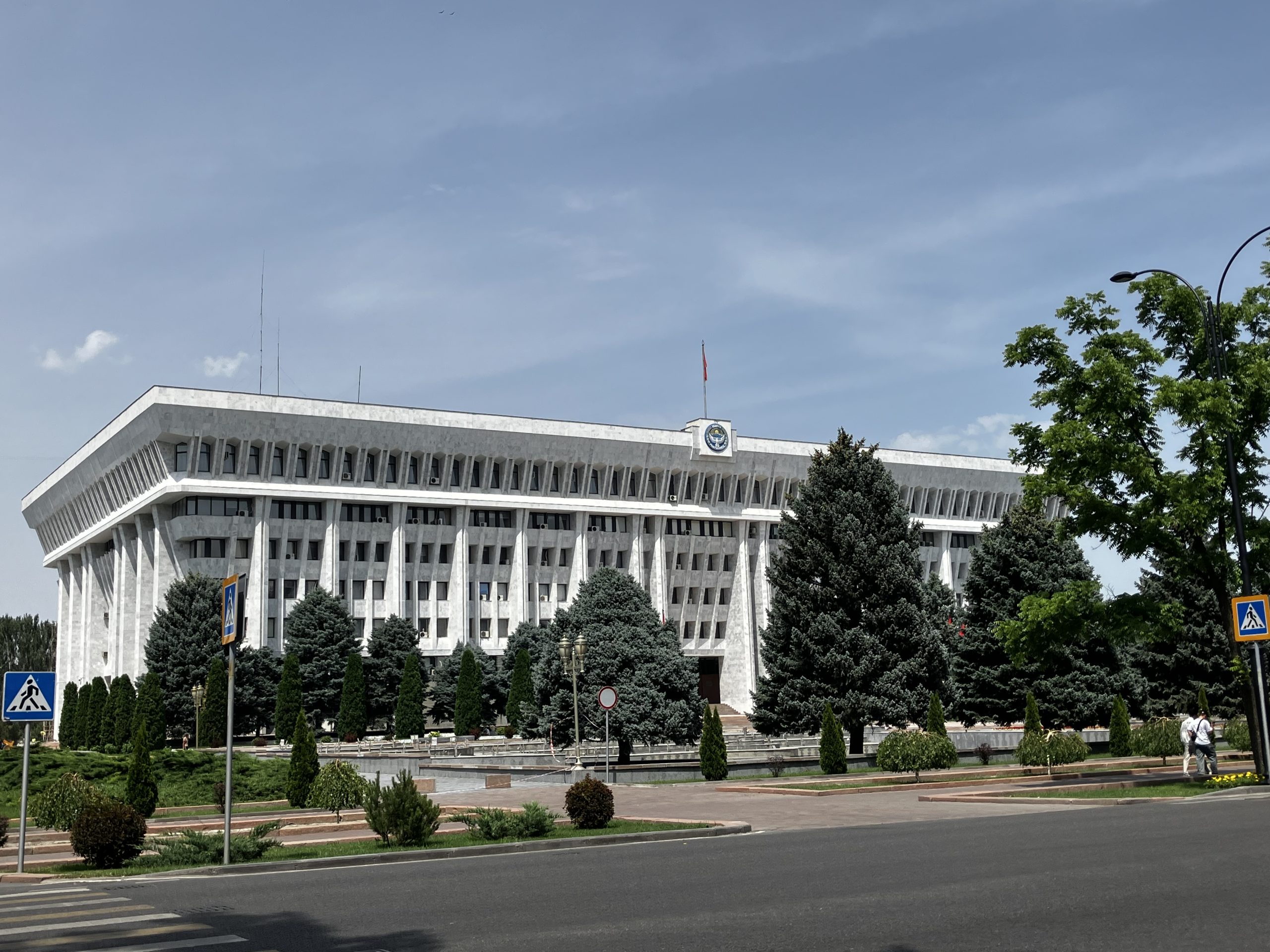 Kyrgyz Parliament in Bishkek on a sunny day in late spring, blue sky.