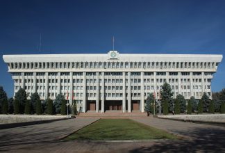 Kyrgyzstan's parliament building on a sunny day.