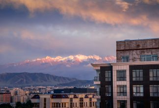 Bishkek skyline against purplish mountains